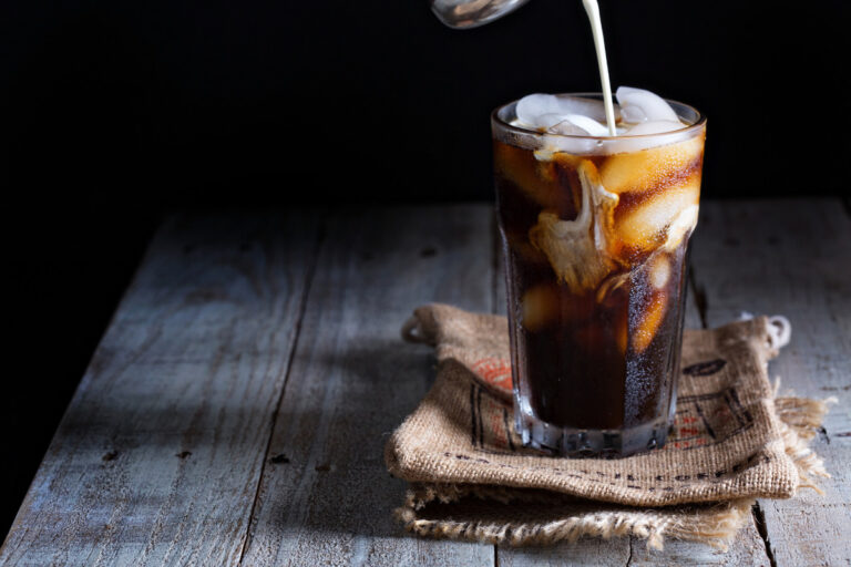 Iced Coffee: The Definition and Meaning Iced coffee in a tall glass
