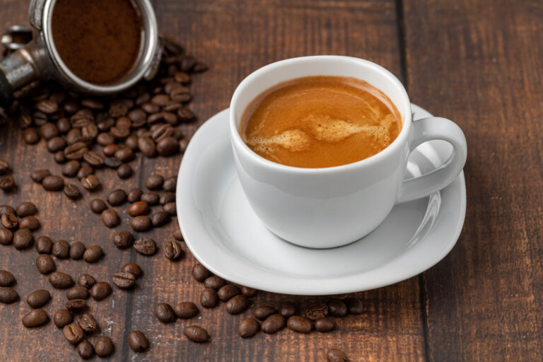 double espresso coffee and coffee beans