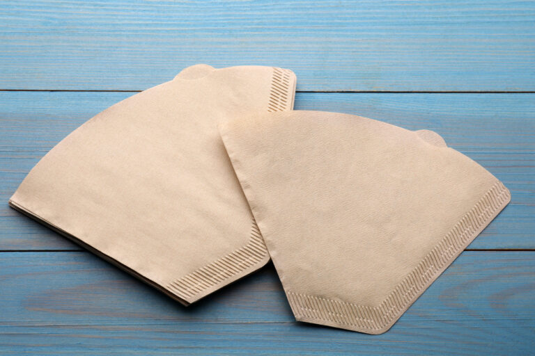 The Best Coffee Filter Brands of the Year Paper coffee filters on light blue wooden table