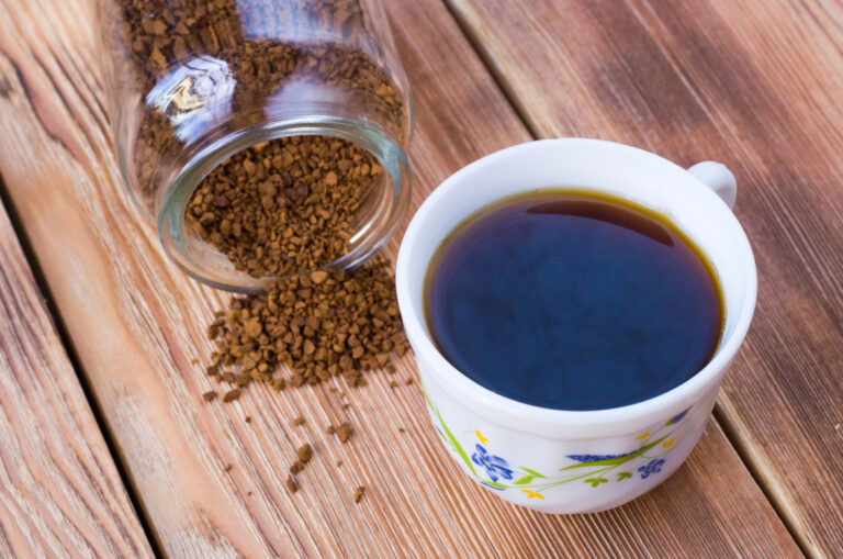 Instant Coffee: The Definition and Meaning mug with a jar of instant coffee