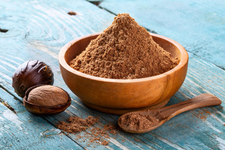 whole and powdered nutmeg